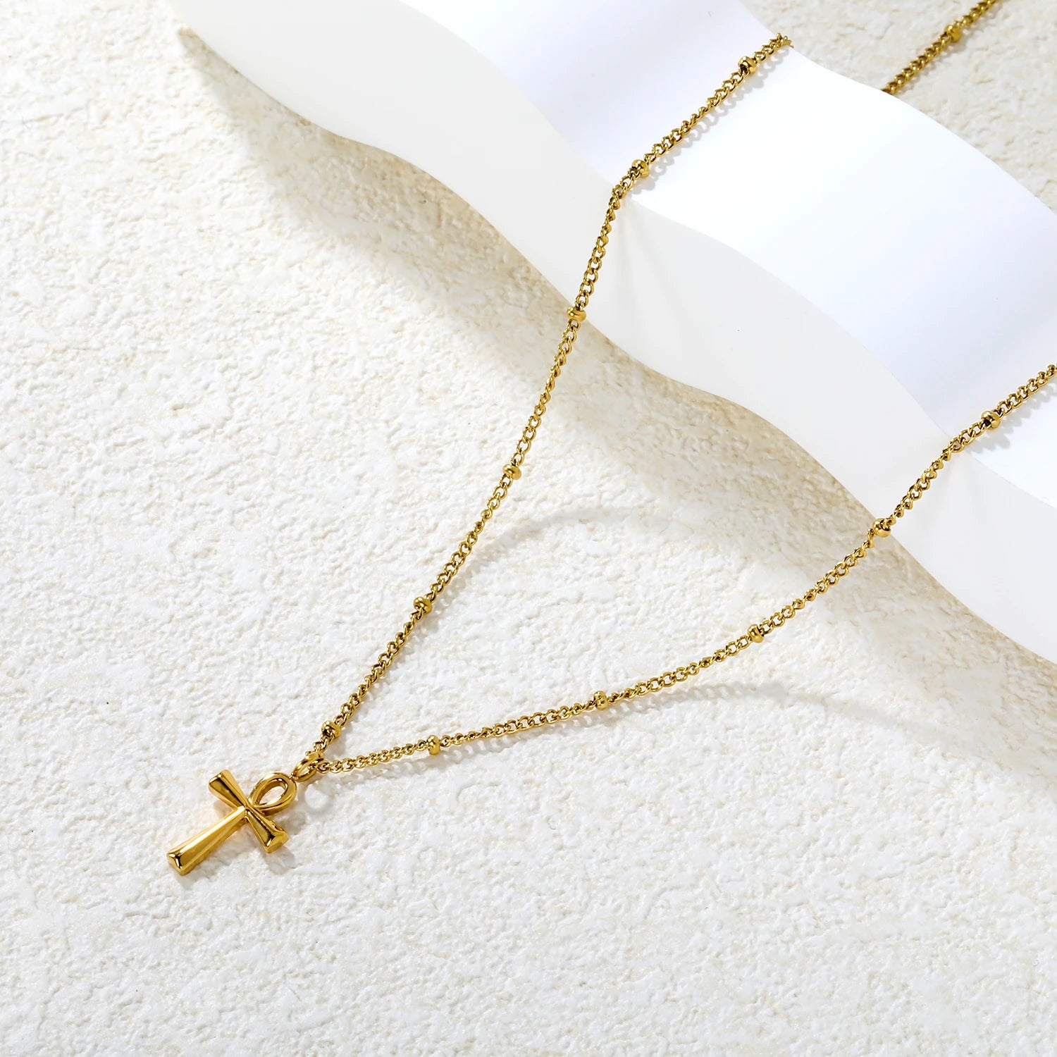 gold cross necklace